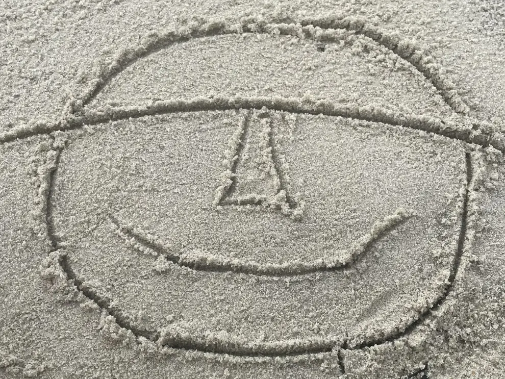 Zen Smile Drawn in Sand